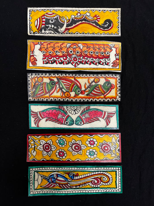 Hand-painted leather bookmarks, made using GI-protected Tholu Bommalata craft.